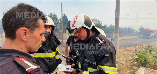 Pompierii romani participa la stingerea incendiilor de vegetatie izbucnite in regiunea Attica din Grecia, luni, 23 august 2021. IGSU Foto: IGSU.